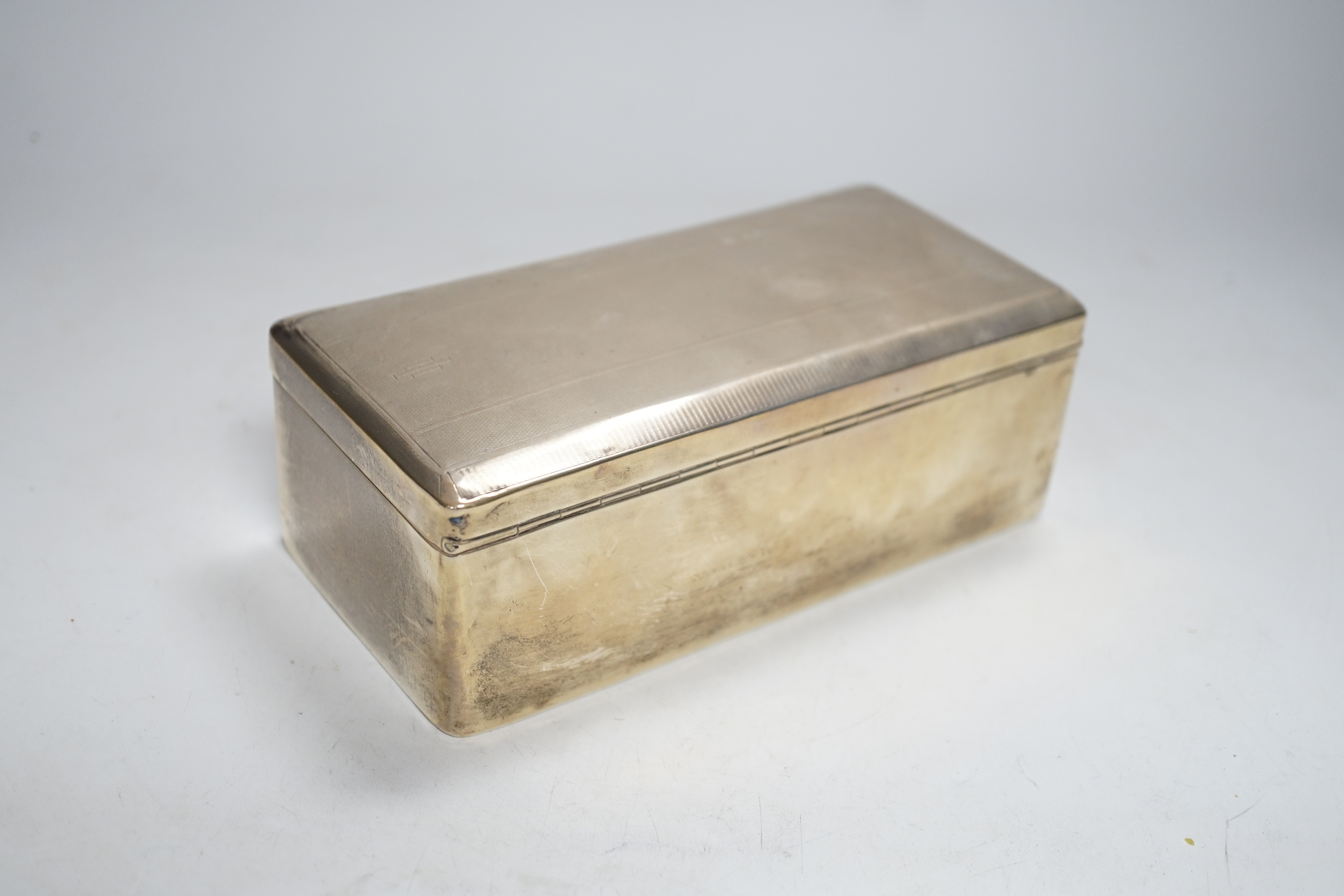 A George V Art Deco silver mounted rectangular cigarette box, Birmingham, 1930?, 17.5cm.